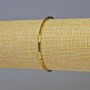 Pulsera de hematita en forma rectangular, color dorado, dimensiones 7×2 mm ±, longitud 18 cm ±, con base elástica