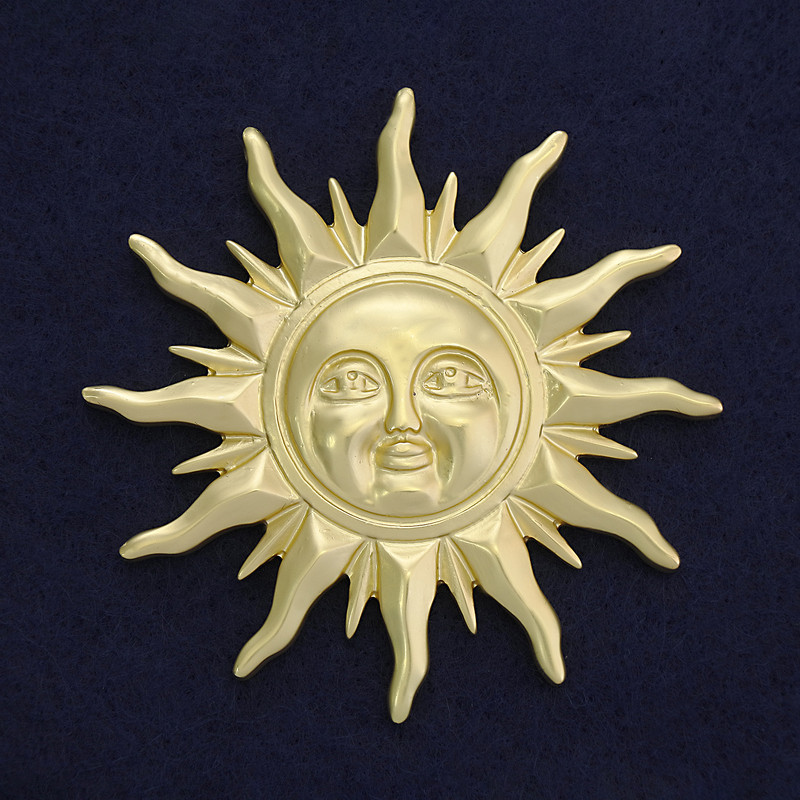 Broche 'Sol' color oro mate, metal dorado, 68 mm ±, con imán