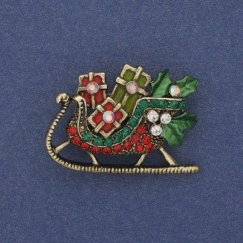 Broche navideño 'Trineos navideños' con esmalte multicolor y strass, metal dorado 35x24 mm +
