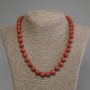 Collar de coral poroso, bolas lisas, diámetro 10 mm +-, longitud 50 cm +- con cierre