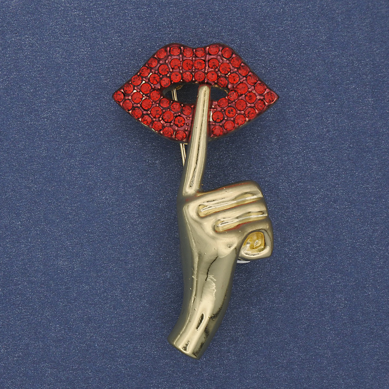 Broche Acento con strass rojos, metal dorado 45×24 mm+