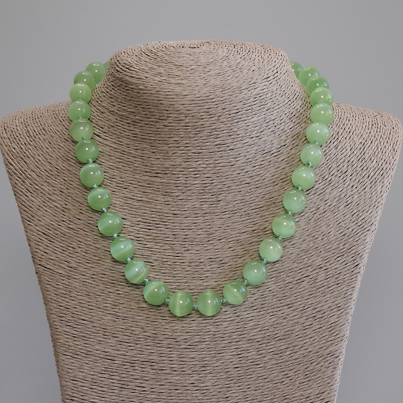 Collar de ojo de gato, bolas lisas de 12 mm, longitud 50 cm +/- con cierre