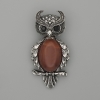 Broche-pendiente «Búho» con cornalina 60 × 29 mm ±, cristales negros, metal plateado