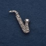 Broche 'Saxofón' 5x2 cm, metal gris
