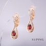 Pendientes Xuping con piedra roja 25×8 mm, baño de oro 18K