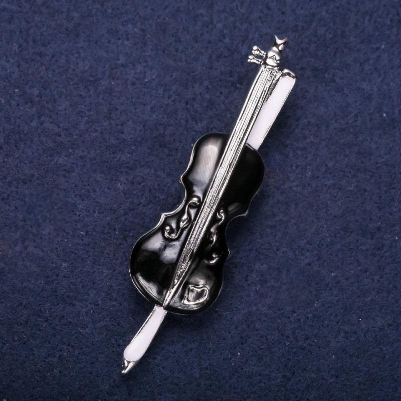 Broche musical — Violín, esmalte negro, metal plateado, 65×17 mm