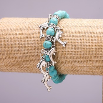 Pulsera con turquesa y colgantes de delfines