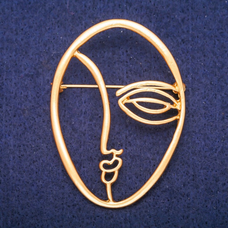 Broche «Acento Cara» en metal dorado 43×60 mm
