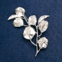 Broche Rama con hojas, metal plateado 62×40 mm
