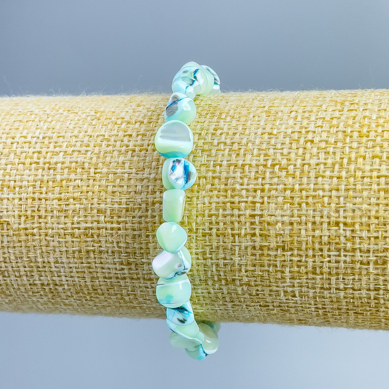 Pulsera de nácar azul claro facetado, diámetro 8×6 mm, longitud 18 cm (elástico)