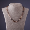Collar de cuarzo rutilado Volosatik (marrón chocolate) facetado en óvalos, diámetro 8-10 mm, longitud 45 cm