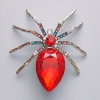 Broche-colgante «Araña» con cristal rojo y cristales de strass multicolor, metal plateado 56×64 mm